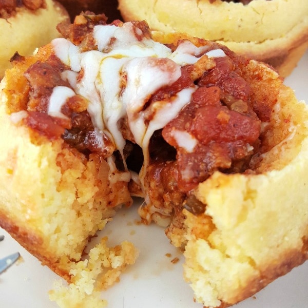 Close up of corn muffin chili cups.