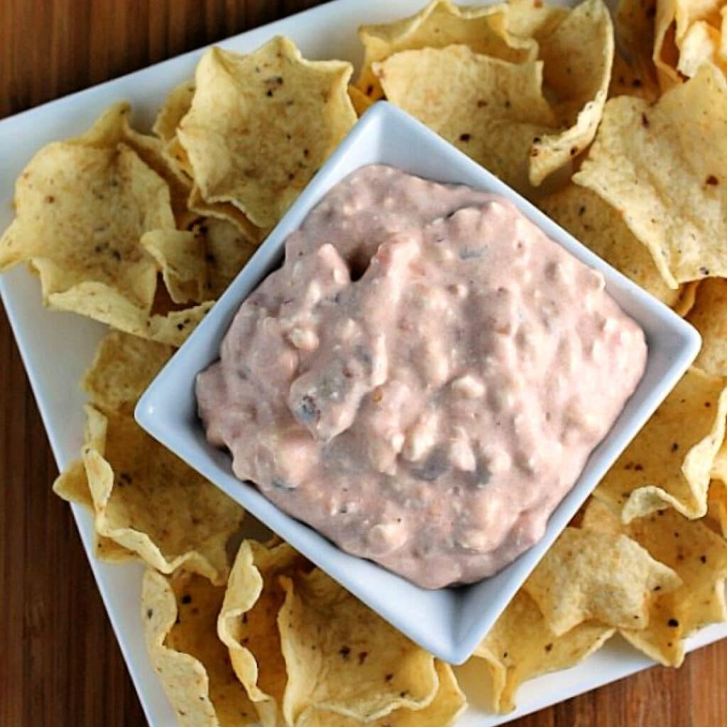 Best dips for game day: Creamy Salsa in a bowl with tortilla chips.