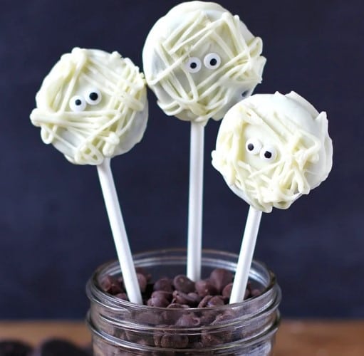 Easy Halloween Oreo Mummy Pops in a jar.