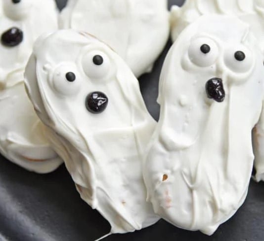 Chocolate dipped Ghost Cookies.