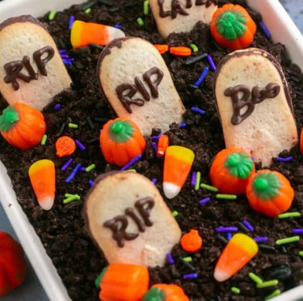 Graveyard Chocolate Cheesecake Dip with candy corn.
