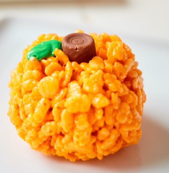 Pumpkin Rice Krispie Treats made with rolos candies.