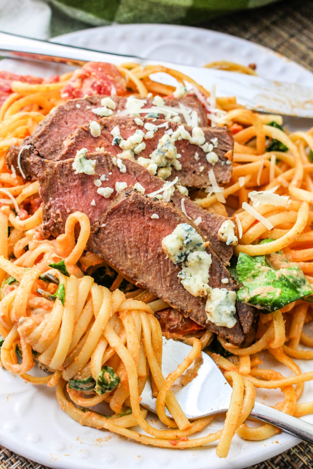 Plate of Steakhouse Pasta dinner with a fork.