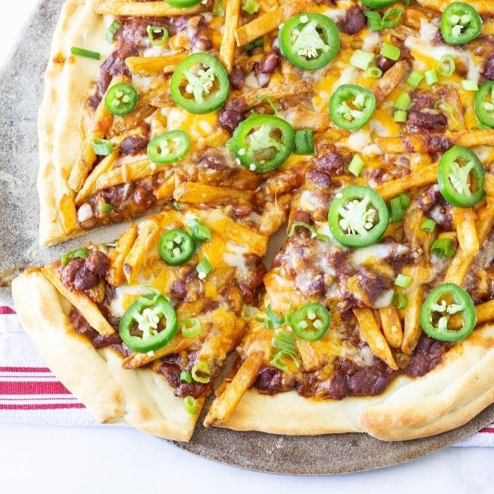Top down view of chili cheese fries pizza.