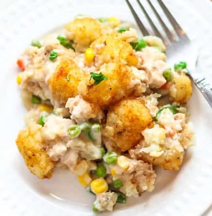 Top down view of Vegan Tater Tot Casserole on a plate with a fork.