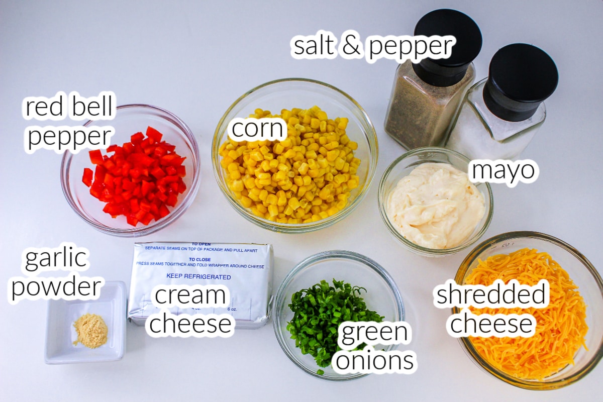 Down down view of Cream Cheese Corn Dip Ingredients with text overlay.
