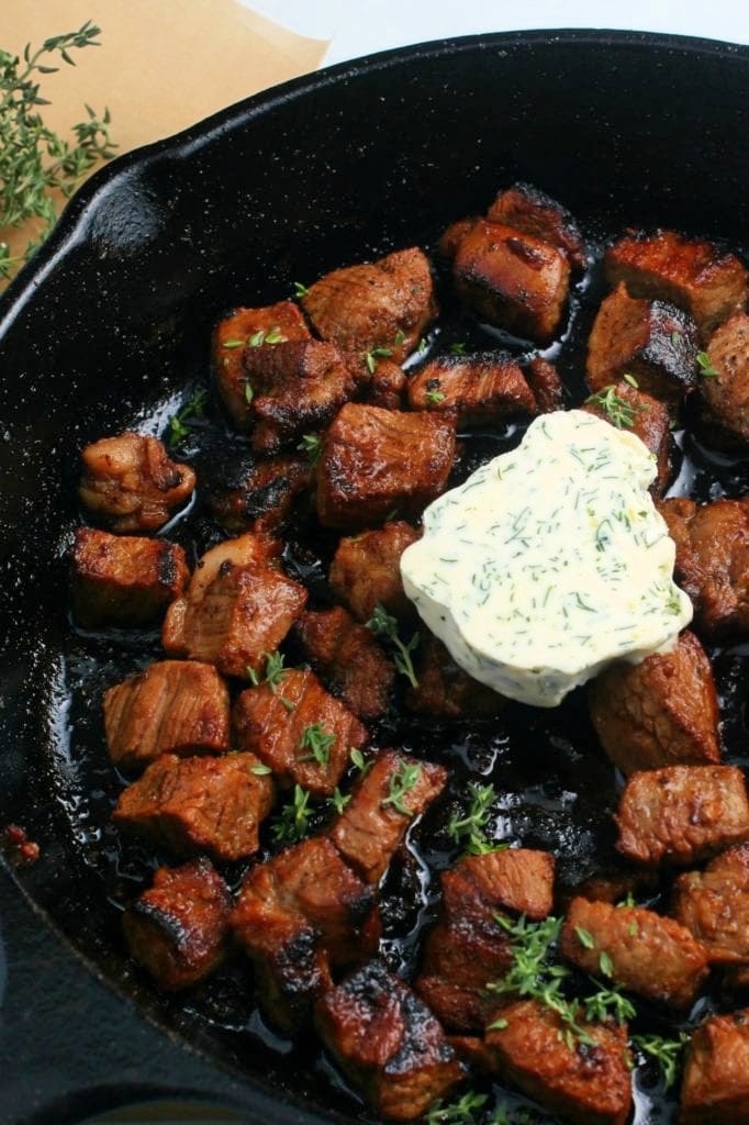 Garlic Butter Steak Bites Recipe - garlic butter and steak bites in a cast iron skillet.