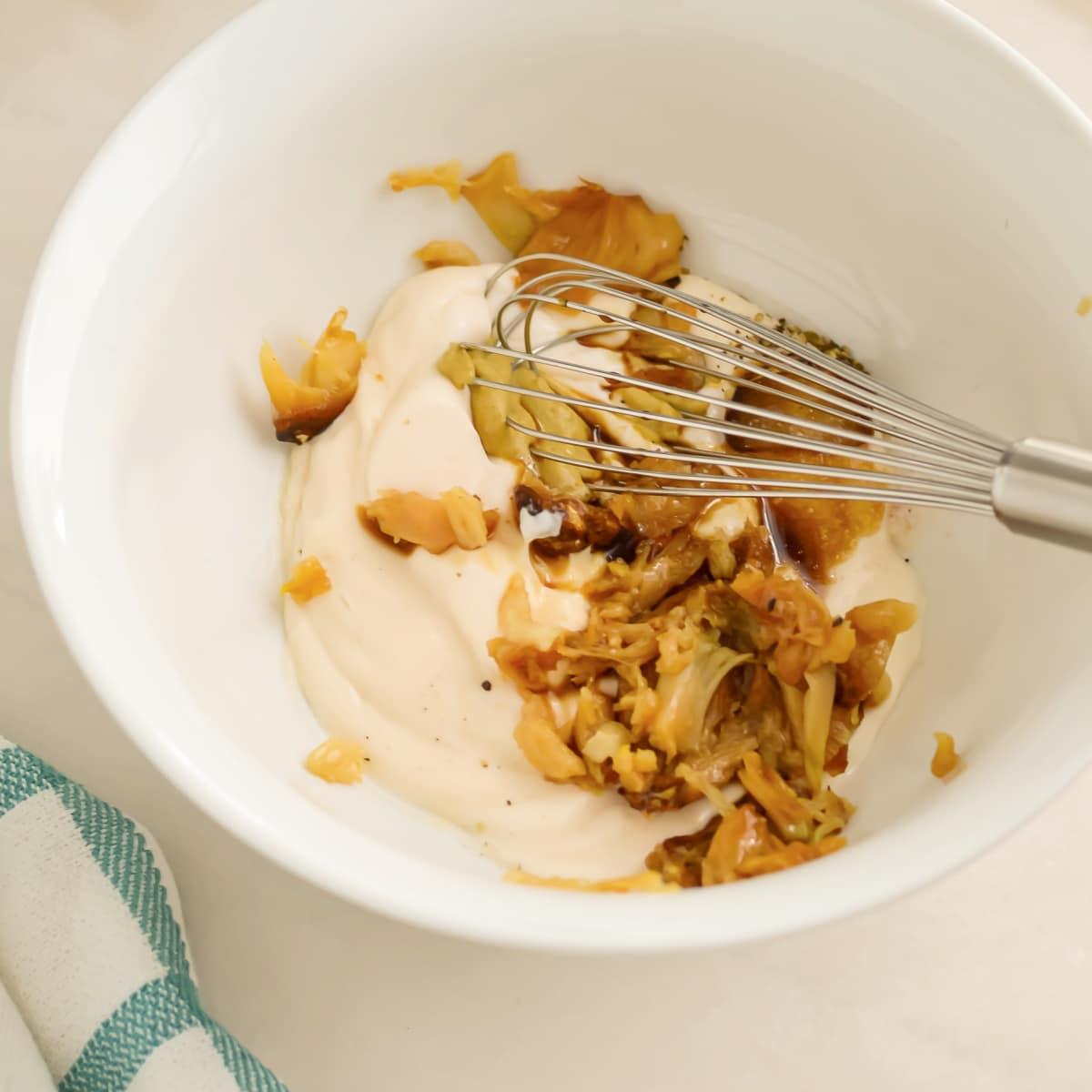 Make Homemade Donkey Sauce ingredients in a bowl with a whisk.