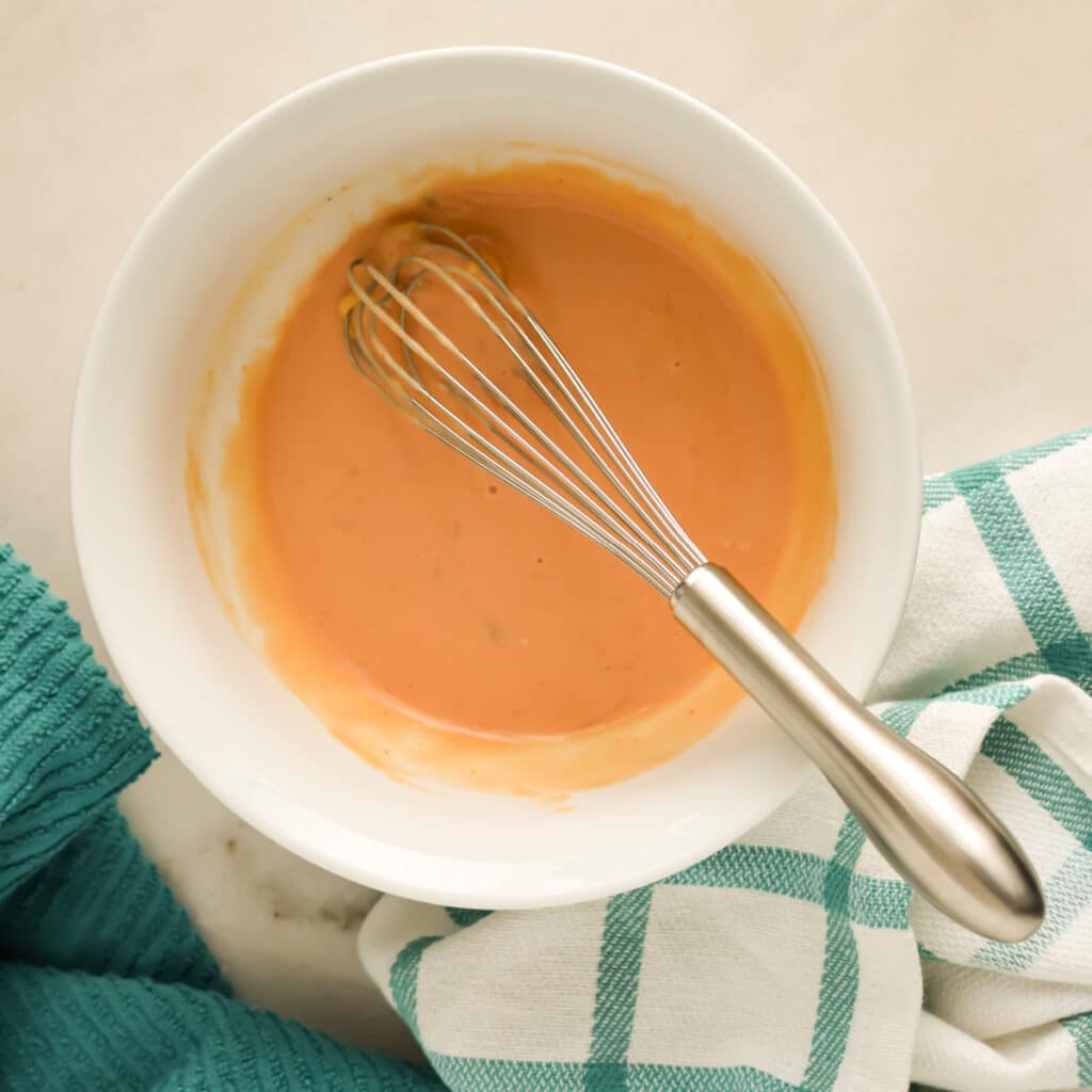 How to make burger sauce - in a bowl with a whisk.