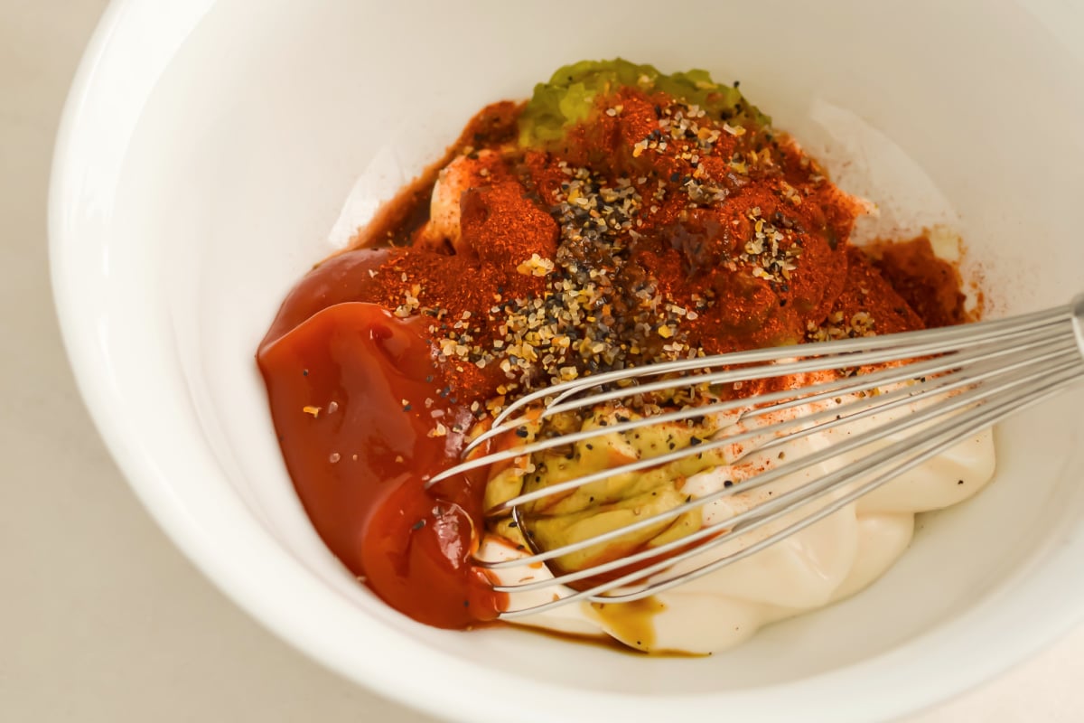 How to Make Smashburger Sauce: bowl of ingredients with a whisk.