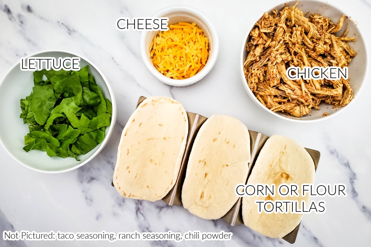 Ranch Chicken Tacos Crockpot Recipe ingredients on a countertop.