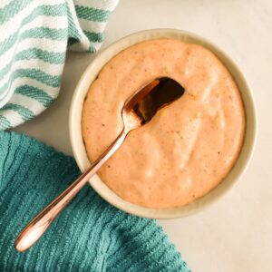 Smashburger Sauce in a bowl with a spoon.