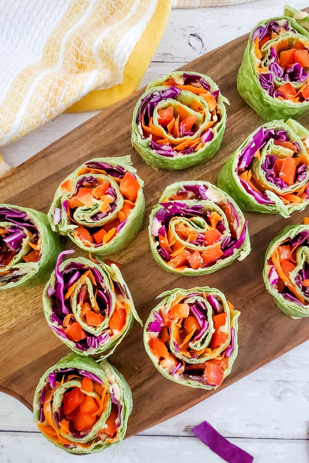 Top down view of Vegetable Pinwheels on a cutting board.