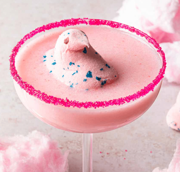 Pink Cotton Candy Martini with a marshmallow peep on top.