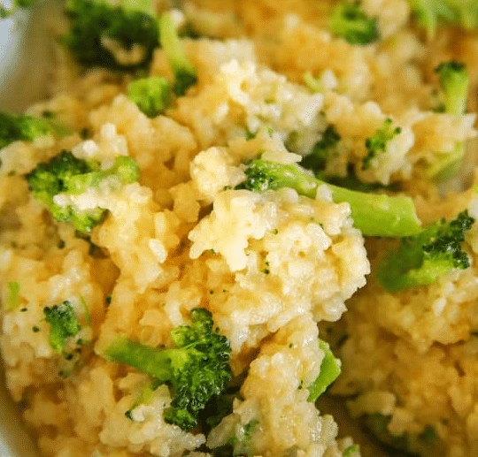 Close up of cheesy broccoli rice.