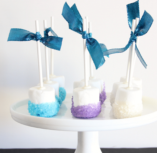 Snowflake marshmallow pops for a Frozen birthday party.