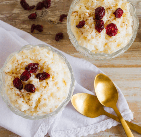 Top down view of rice pudding with cranberries.