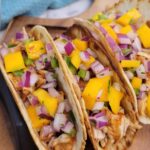 Close up of BBQ Chicken tacos with mango salsa.