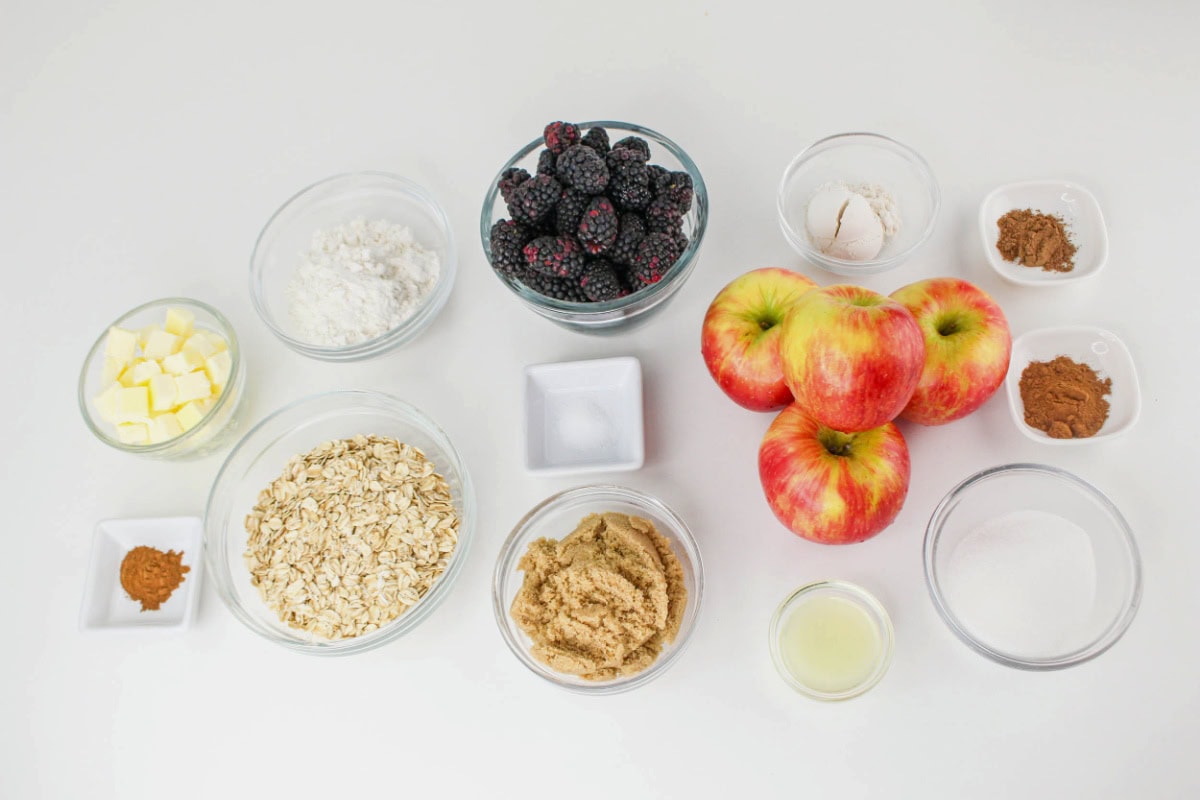 Apple Blackberry Crumble ingredients on a countertop.