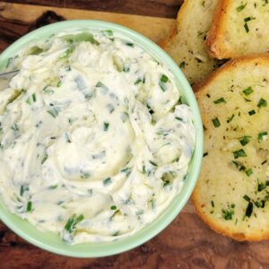 Top down view of Garlic Chive Butter in a bowl.