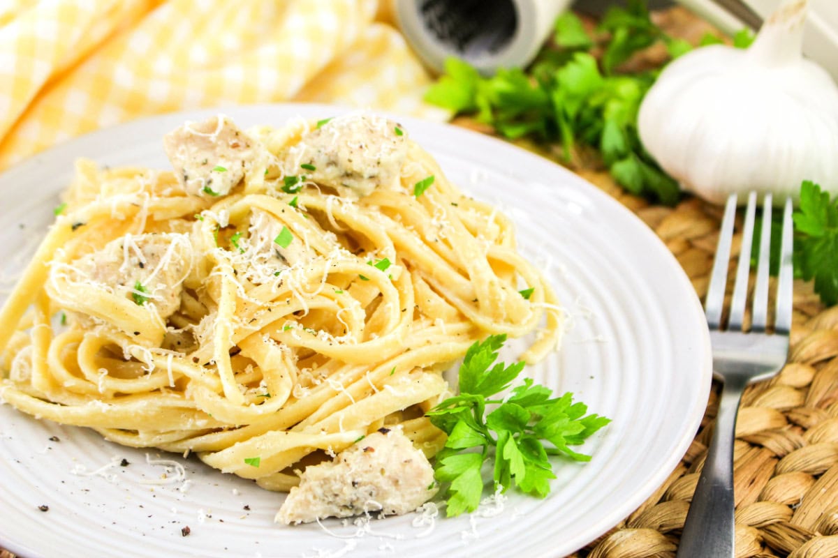 Garlic Parmesan Chicken and Pasta on a plate.