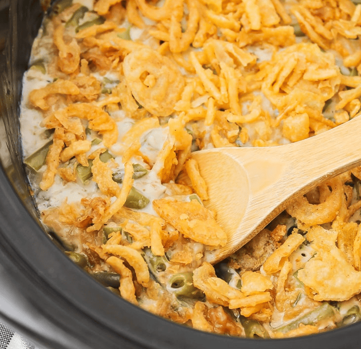 Slow Cooker Holiday Recipes: close up of crockpot green bean casserole.