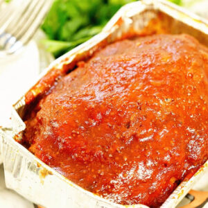 Close up of instant pot meatloaf in a disposable pan.