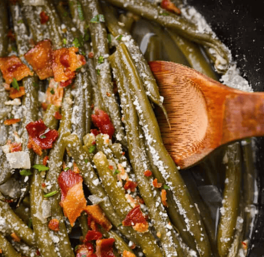 Green beans with bacon in a crockpot.