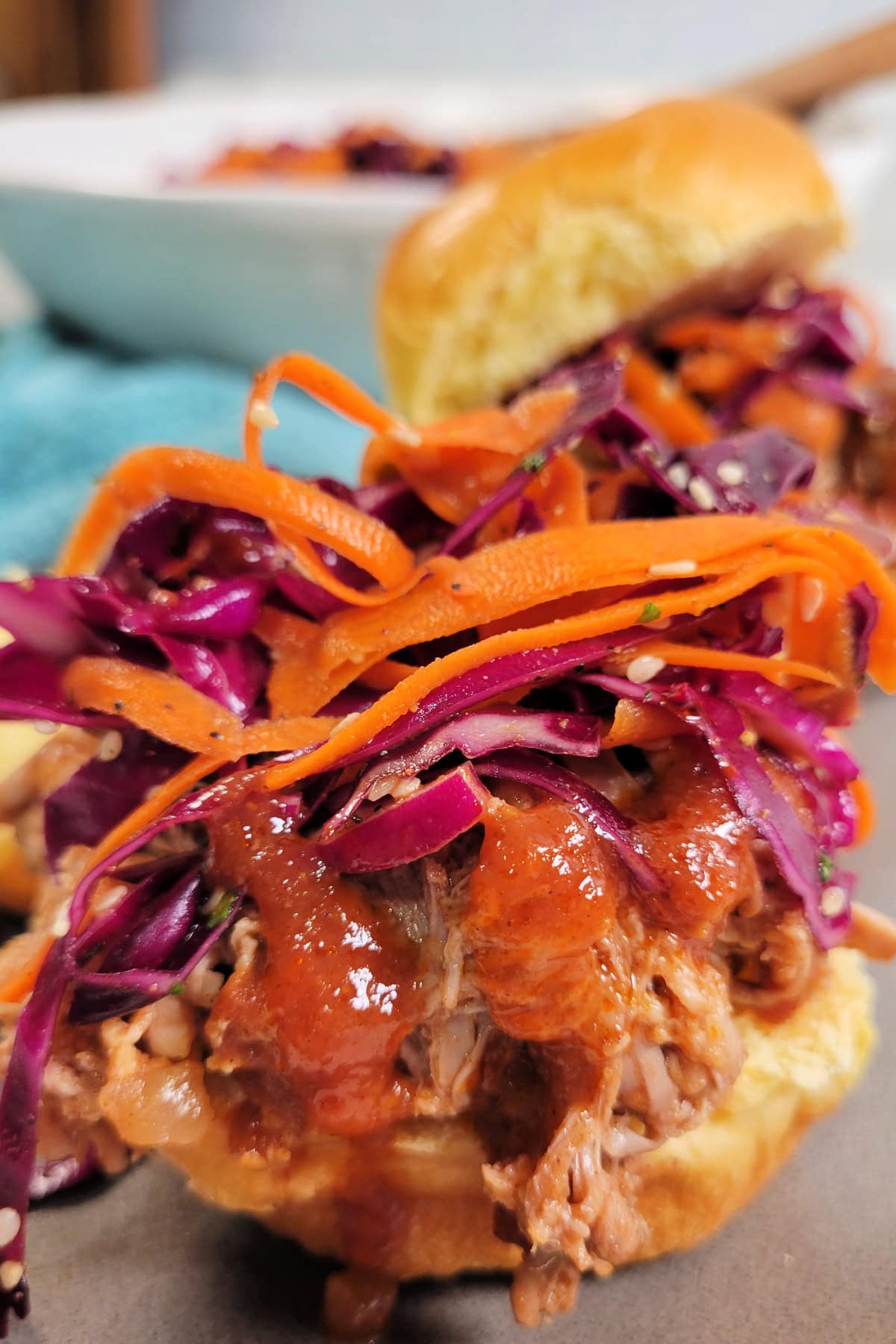 Asian Pulled Pork Sliders with Purple Cabbage and Carrot Slaw.