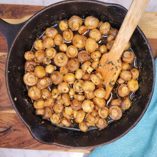 Top down view of Garlic Butter Mushrooms in a skillet.