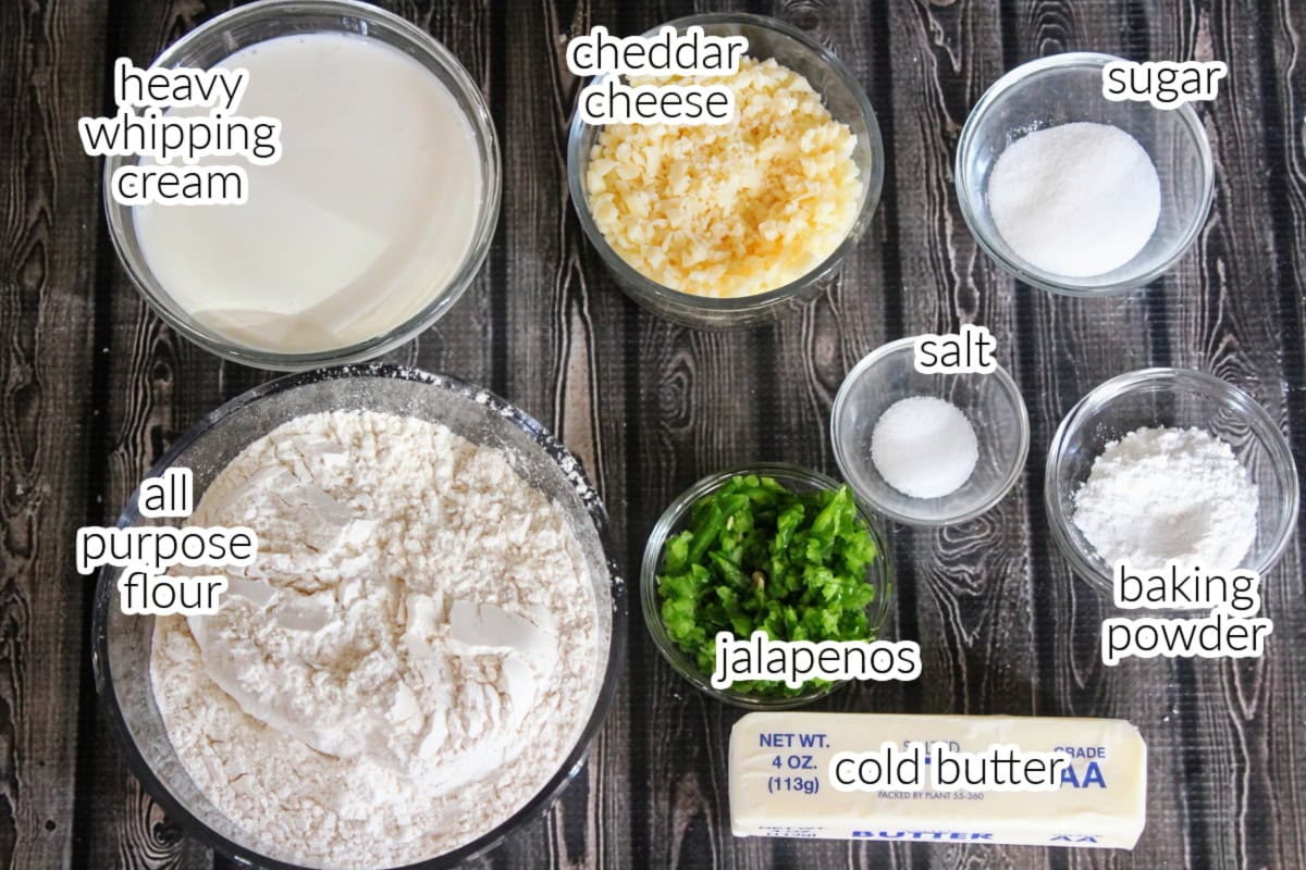 Top down view of jalapeno cheddar biscuits ingredients with text overlay.