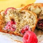 Banana Raspberry Muffins Recipe: feature image of banana muffin with raspberries.