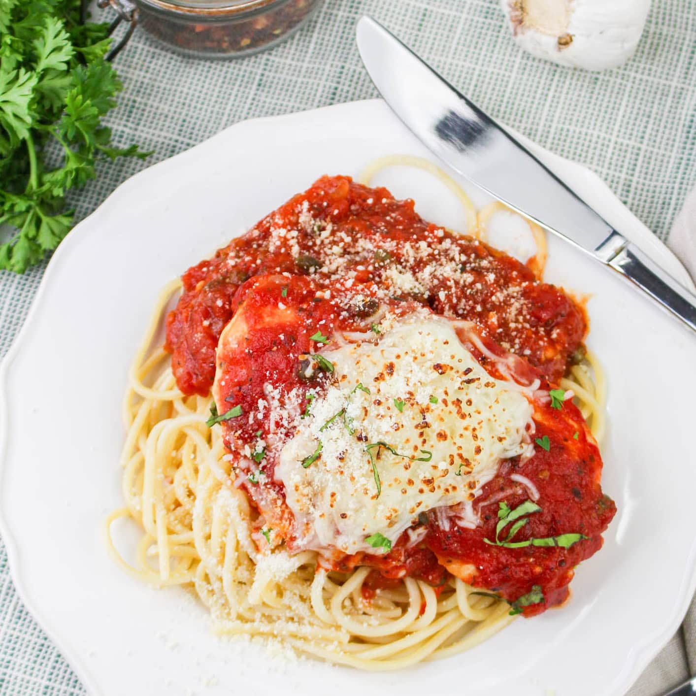 Chicken Pizzaiola with spaghetti.